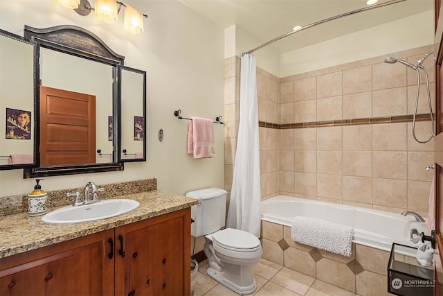 full bathroom featuring shower / bath combination with curtain, tile patterned flooring, vanity, and toilet