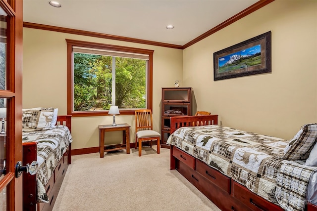 carpeted bedroom with crown molding