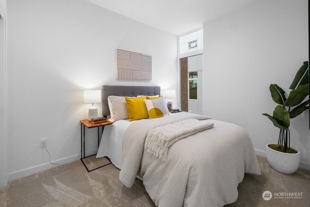 bedroom with light carpet