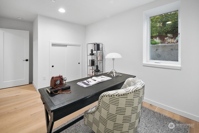 office area with hardwood / wood-style flooring