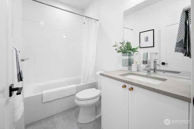 full bathroom featuring shower / bath combo, vanity, and toilet