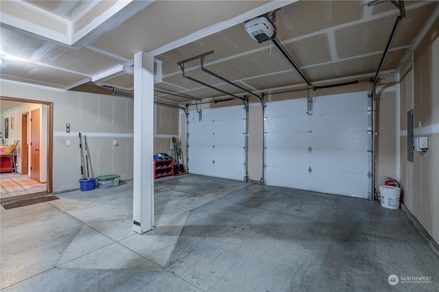 garage featuring a garage door opener