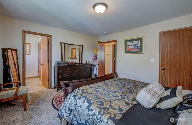 bedroom with light carpet