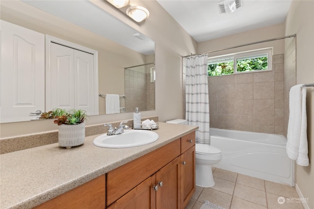 full bathroom with toilet, vanity, tile patterned floors, and shower / bathtub combination with curtain