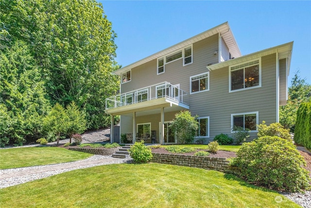 3377 Topaz Ct, Bellingham, WA 98226 - rear view of house with a lawn and a wooden deck