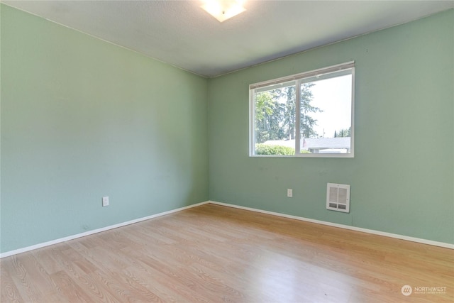 empty room featuring light hardwood / wood-style flooring