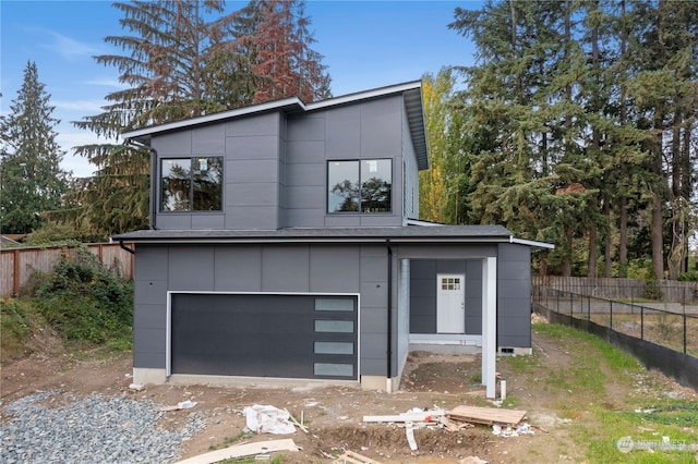 view of front of home featuring a garage