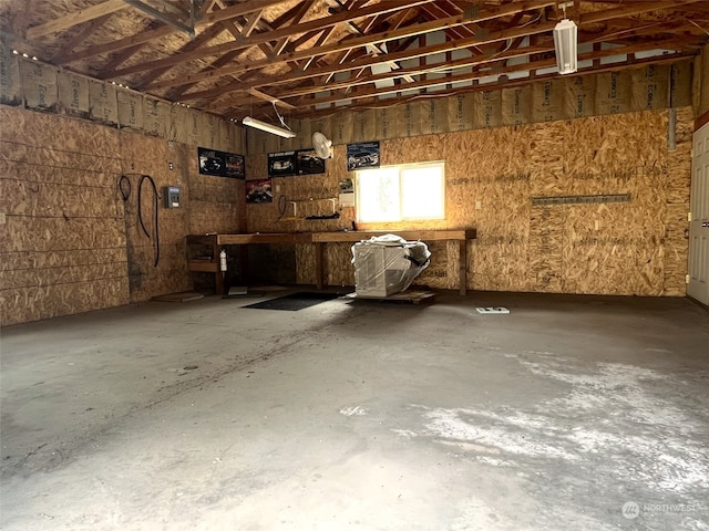 garage with a workshop area