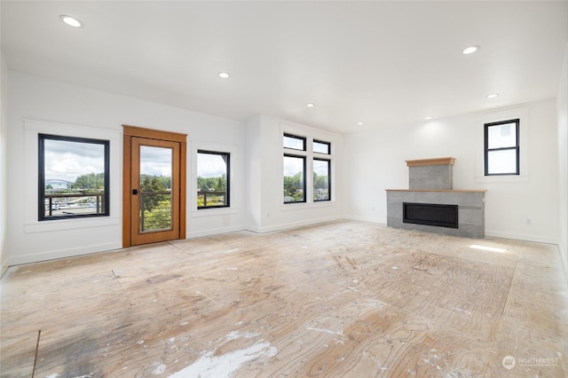 840 Shoshone Dr, La Conner, WA 98257 - unfurnished living room with a fireplace, baseboards, and recessed lighting