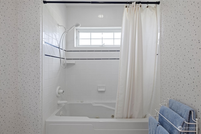 bathroom featuring shower / bath combo with shower curtain