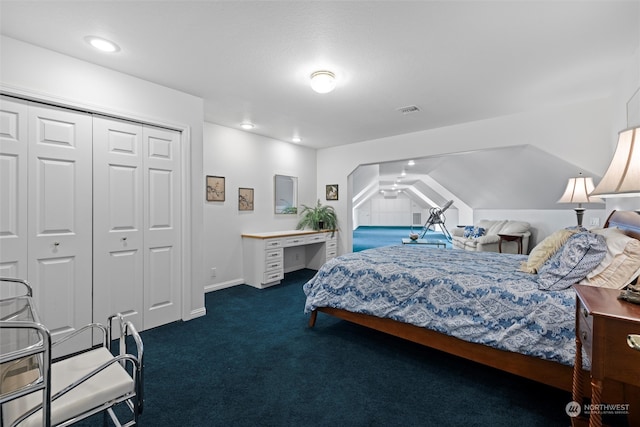 carpeted bedroom featuring a closet