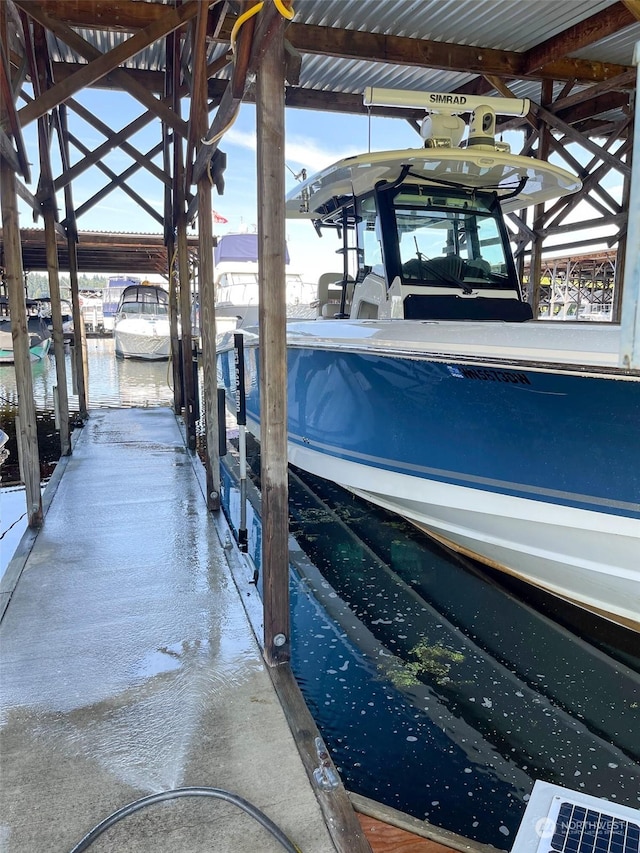 view of dock with a water view