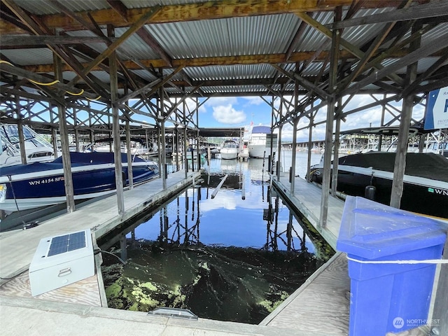 view of dock with a water view