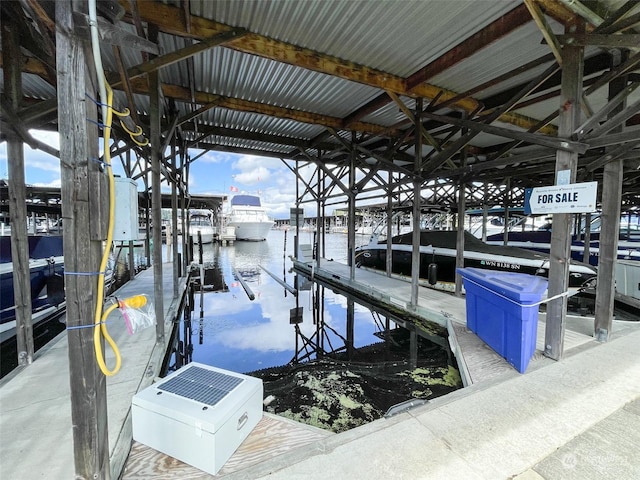 view of dock with a water view