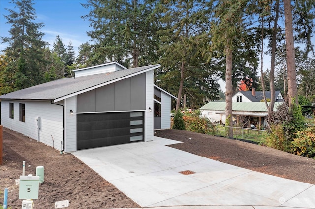 view of home's exterior with a garage