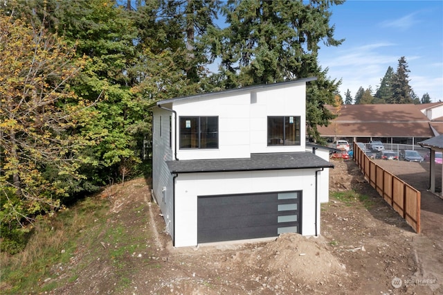 exterior space featuring a garage