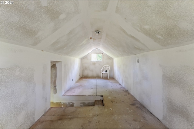 bonus room featuring vaulted ceiling