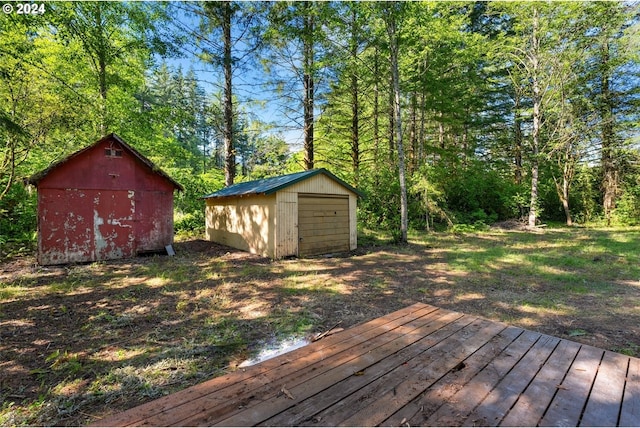 deck featuring an outdoor structure