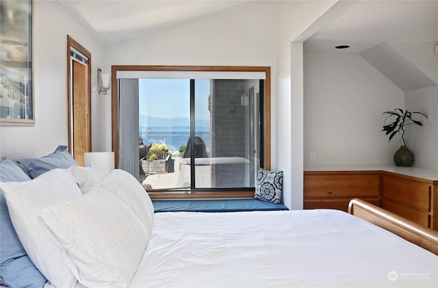 bedroom featuring lofted ceiling