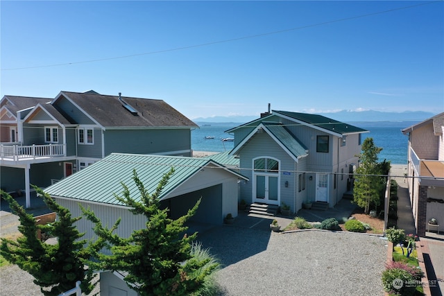 view of front of property featuring a water view