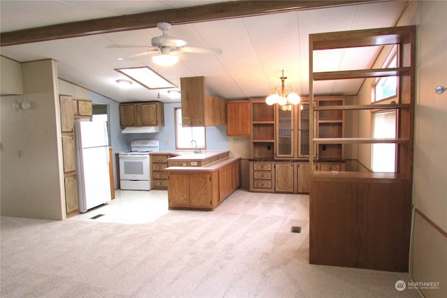 kitchen with kitchen peninsula, white appliances, and lofted ceiling with beams