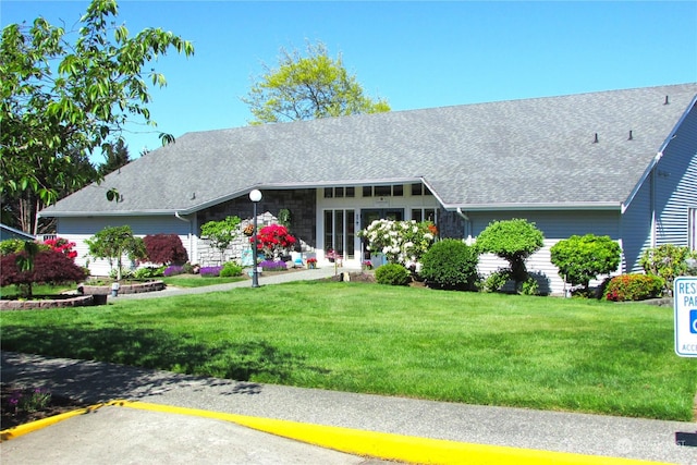 ranch-style house with a front yard