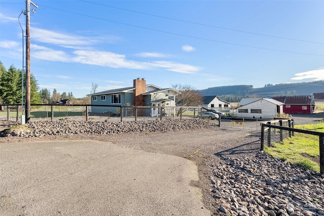 exterior space featuring a mountain view