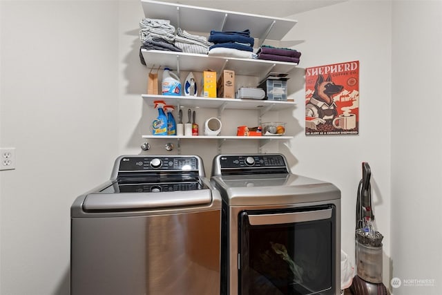 laundry area with independent washer and dryer