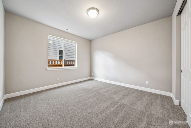 view of carpeted spare room