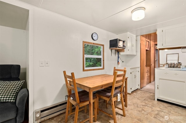 dining room with baseboard heating