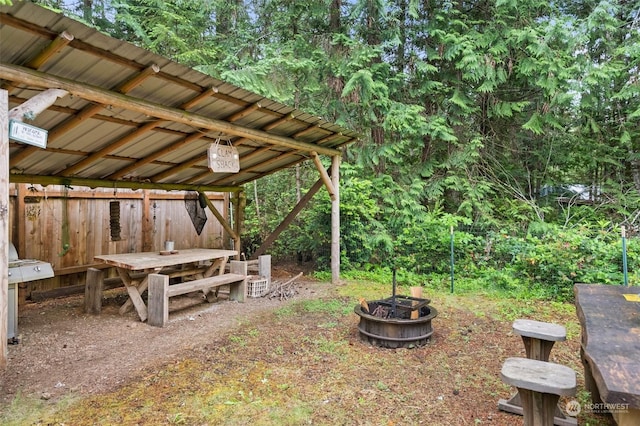 view of yard featuring a fire pit