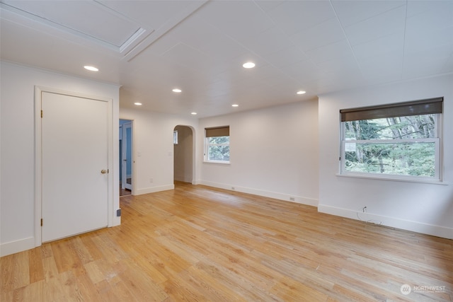 unfurnished room with light hardwood / wood-style floors