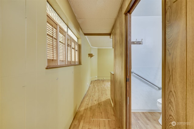 hall with light hardwood / wood-style flooring