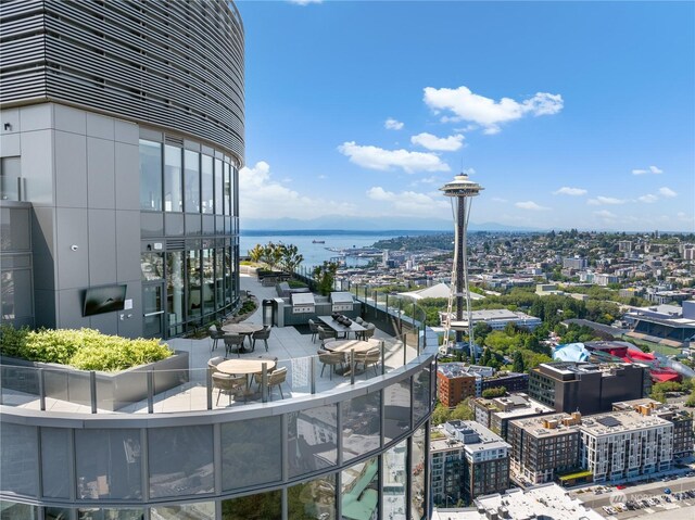 property's view of city featuring a water view