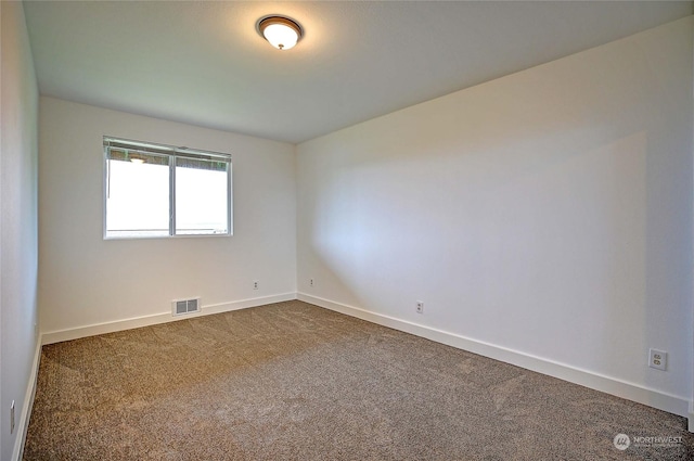 empty room with carpet floors