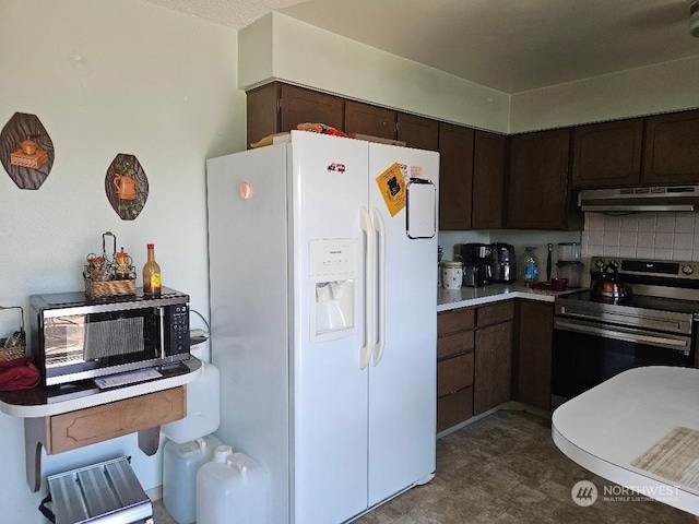 kitchen with tasteful backsplash, appliances with stainless steel finishes, and dark brown cabinets