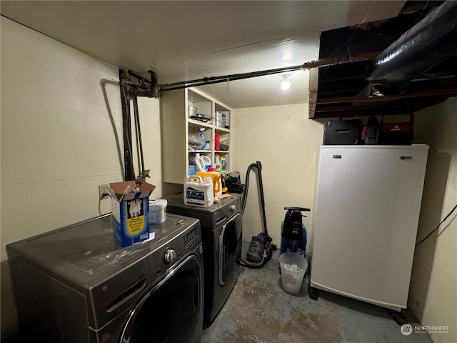 laundry area with washer and dryer