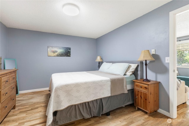 bedroom featuring light hardwood / wood-style floors