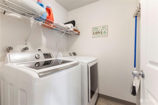 laundry room featuring washer and clothes dryer