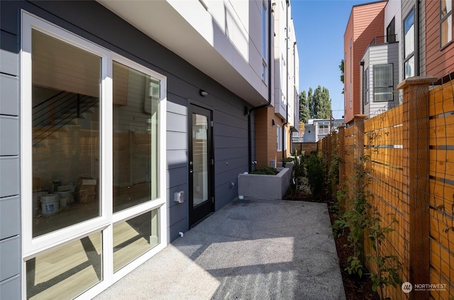 view of property exterior featuring a patio area