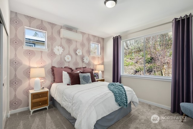 carpeted bedroom featuring an AC wall unit