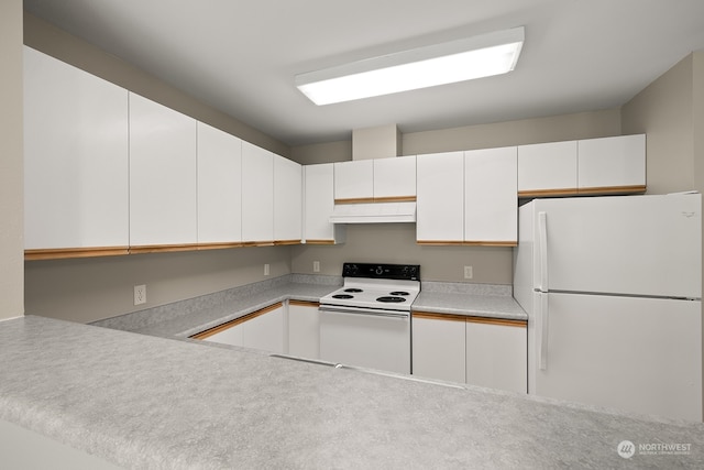 kitchen featuring white cabinets, white appliances, and premium range hood