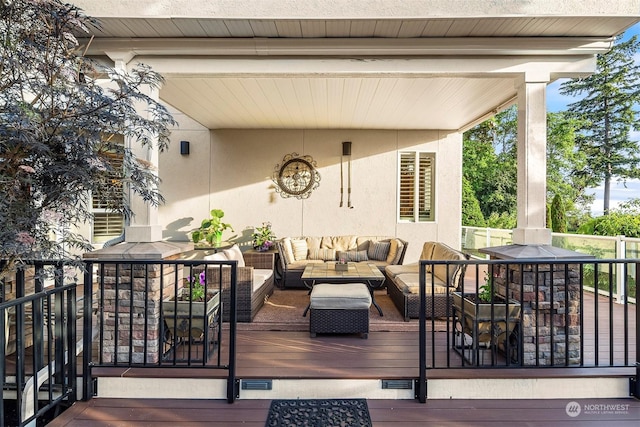 wooden deck with outdoor lounge area