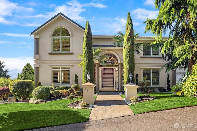 view of front of home featuring a front yard