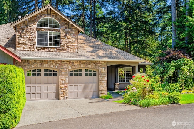 view of front of property featuring a garage