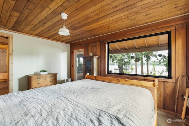 bedroom featuring wood ceiling and wood-type flooring