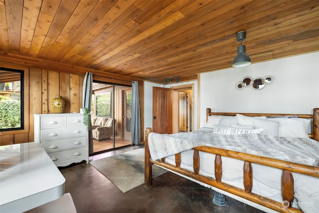 bedroom with wood walls and wood ceiling