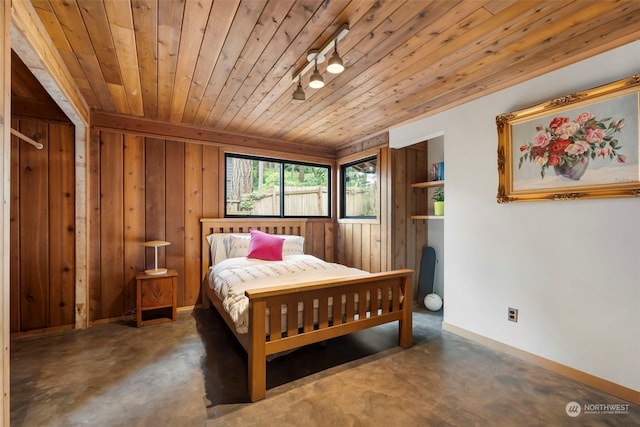 bedroom featuring wood walls and wood ceiling