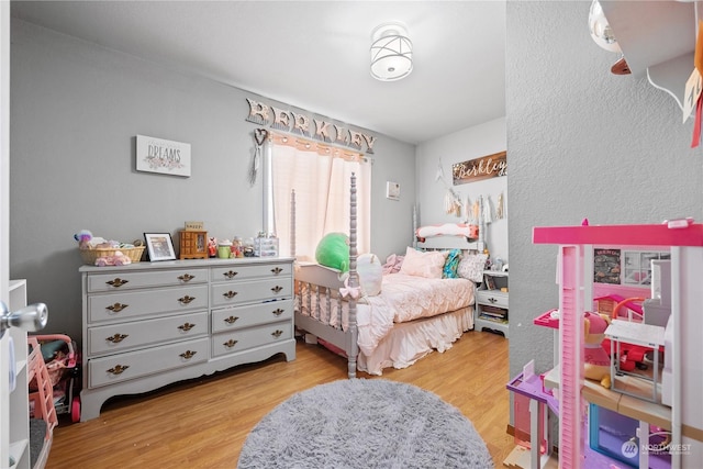 bedroom featuring light hardwood / wood-style flooring