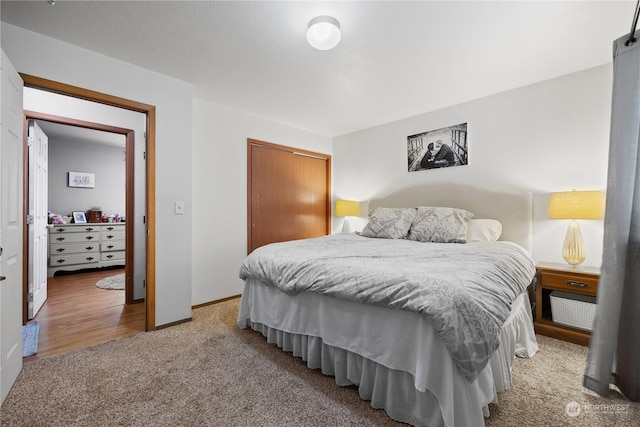 carpeted bedroom featuring a closet